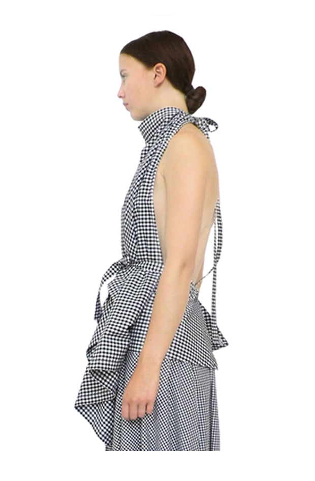 model wears avantgarde crafted bespoke drape blanket top by british design duo cunnington and sanderson