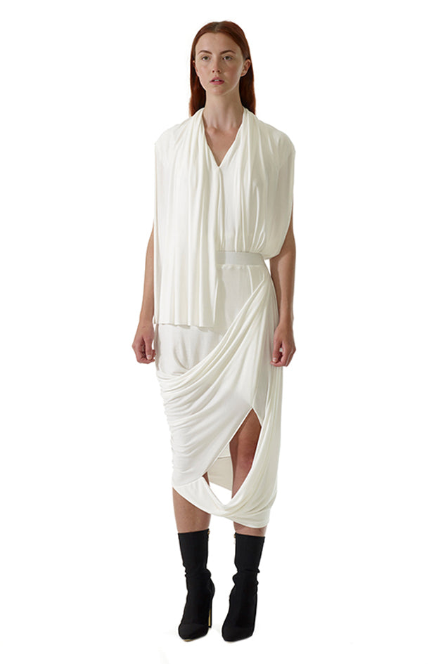 Exclusive white drape curtain top exudes chic elegance, crafted with skilled pattern cutting