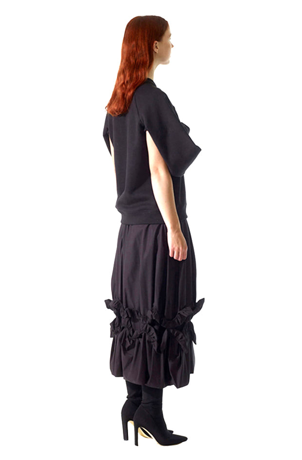 luxury black draped chandelier skirt with aline silhouette and elasticated gathered frill details worn for all occasions