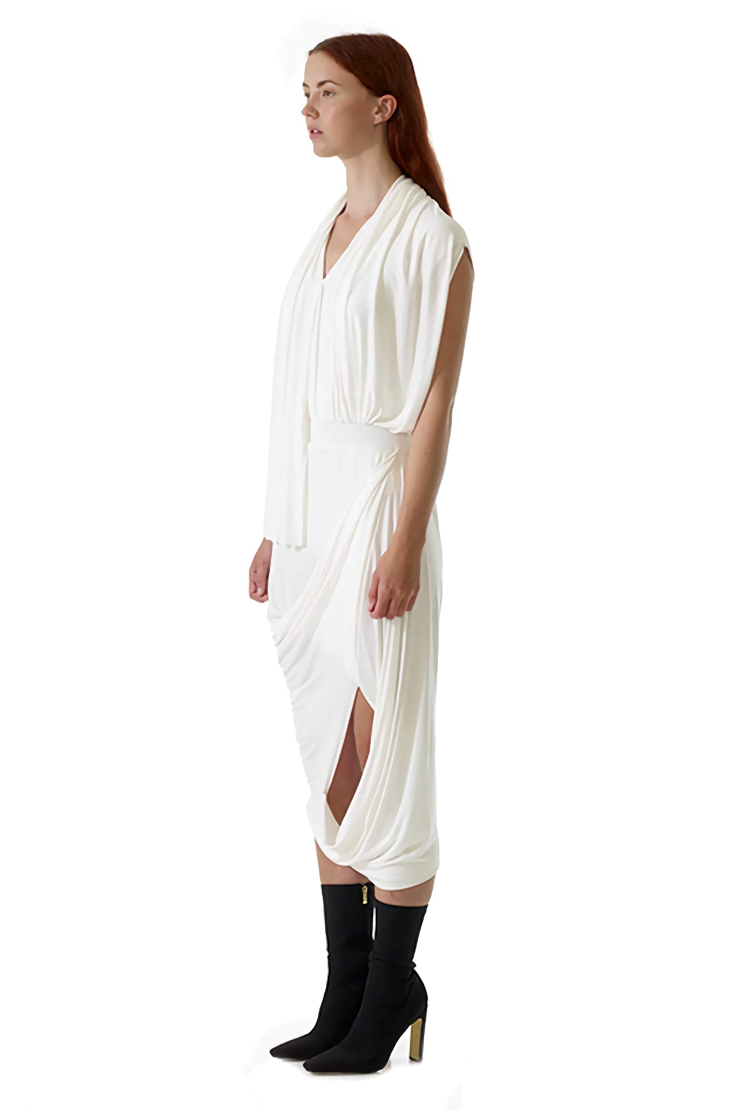 Womenswear model wears a bespoke ivory drape top with contemporary style and elegant comfort