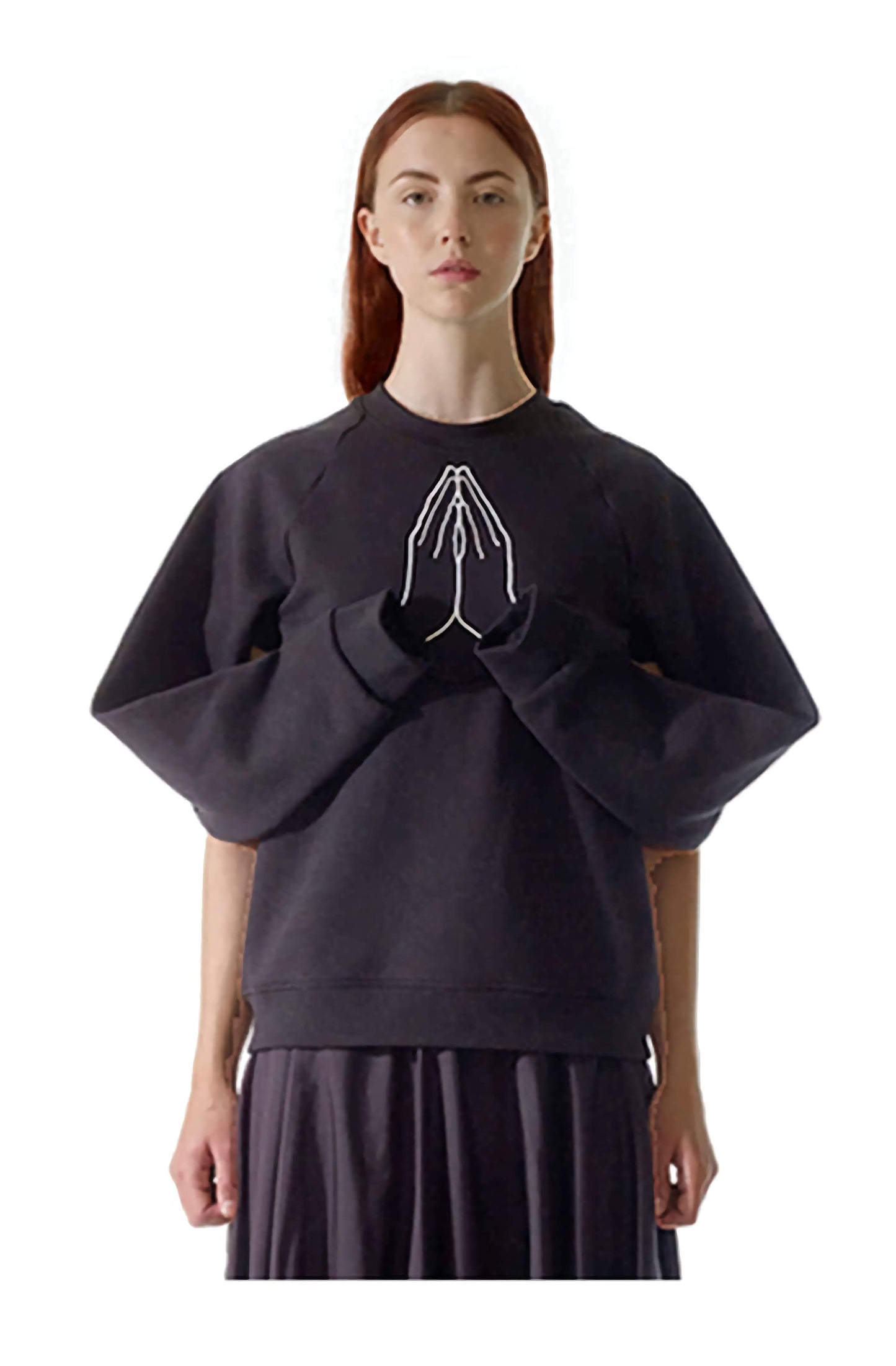 The model wears an award-winning British brand, Cunnington & Sanderson's organic hope sweatshirt, telling the story of hope