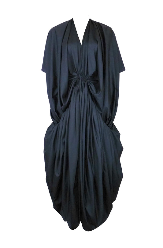 Avant-garde dramatic draped black dress with kimono sleeves and large voluminous pleated pockets