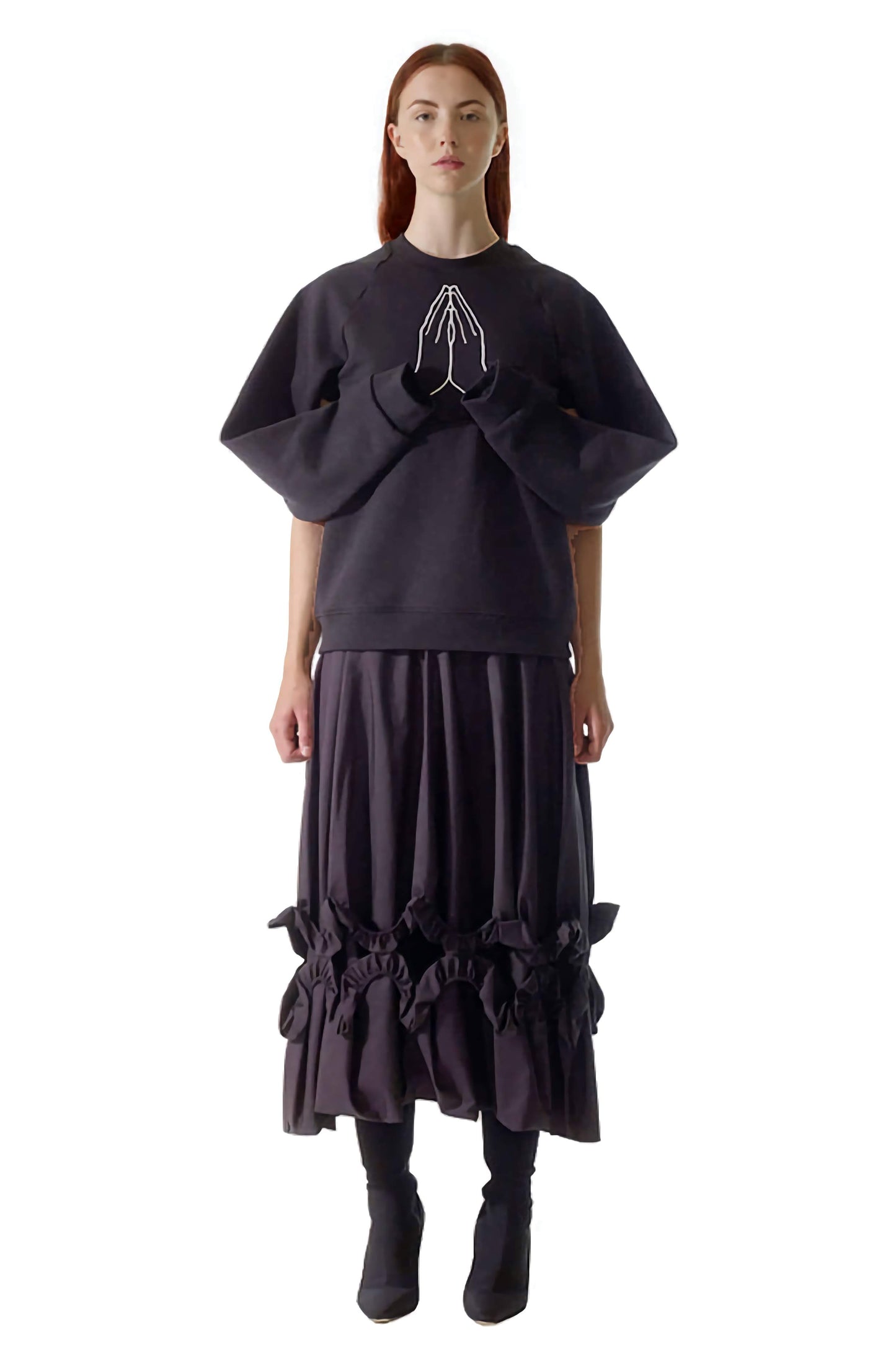 Luxury designer women's sweater made with organic cotton, with embroidered hands, and unique draped sleeves
