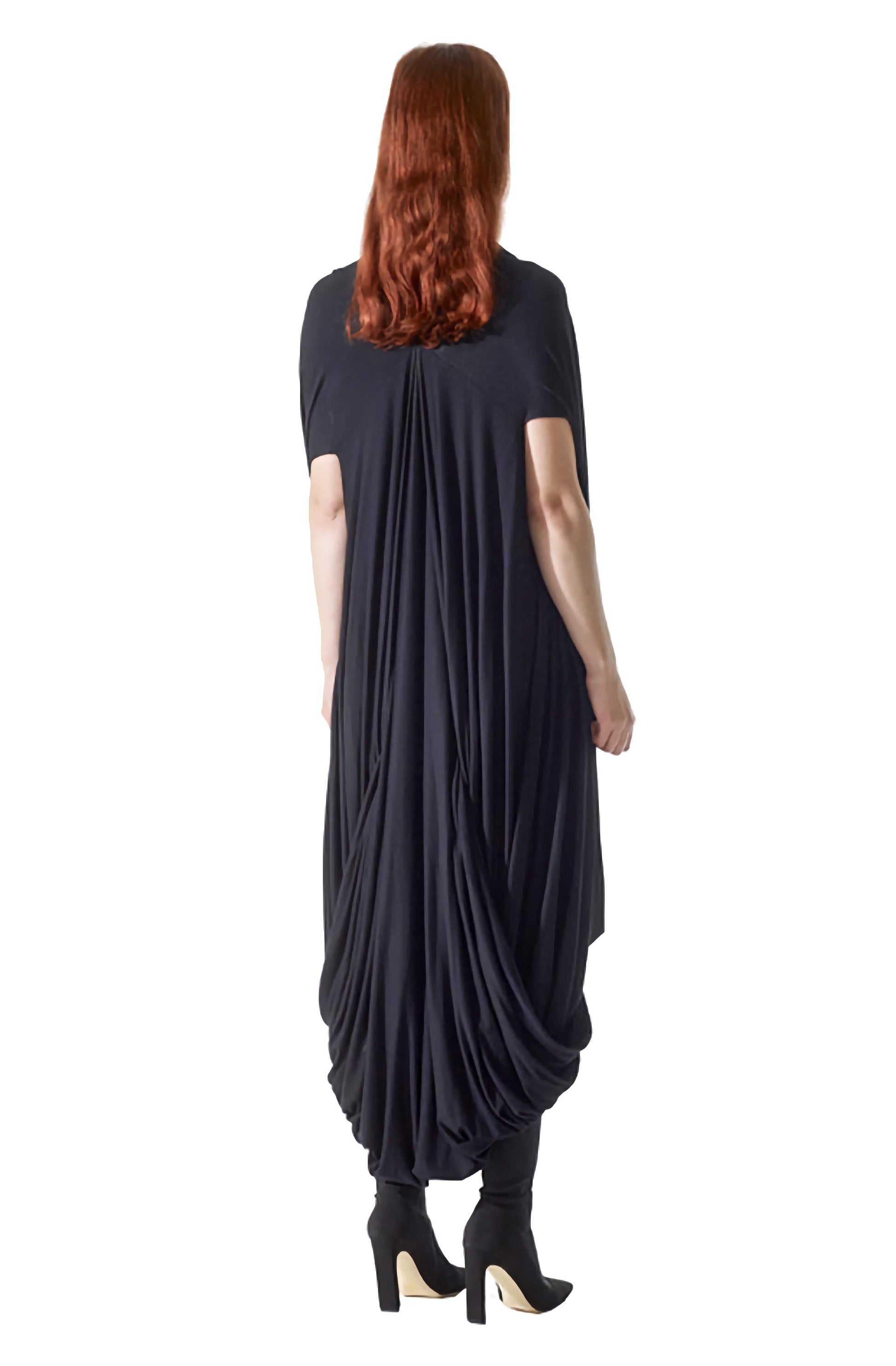 Floaty back view black draped luxury designer dress with contemporary timeless silhouette and modern elegant style.