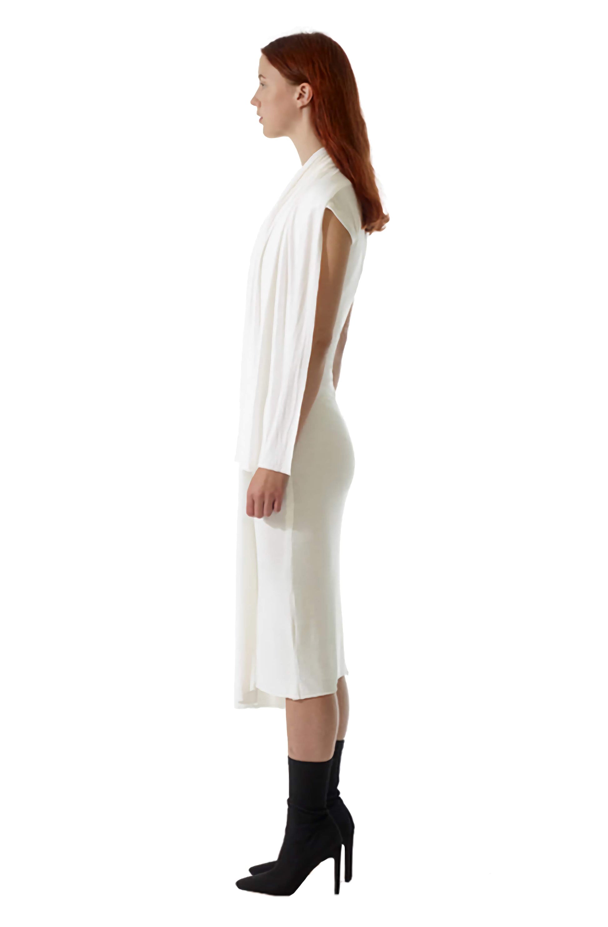 Sophisticated body-con style dress with loose, unique, flowing drapes across the shoulders