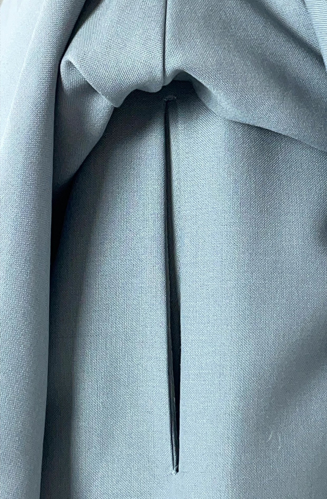 Zero waste hidden pocket skirt detail made with yorkshire grey wool.