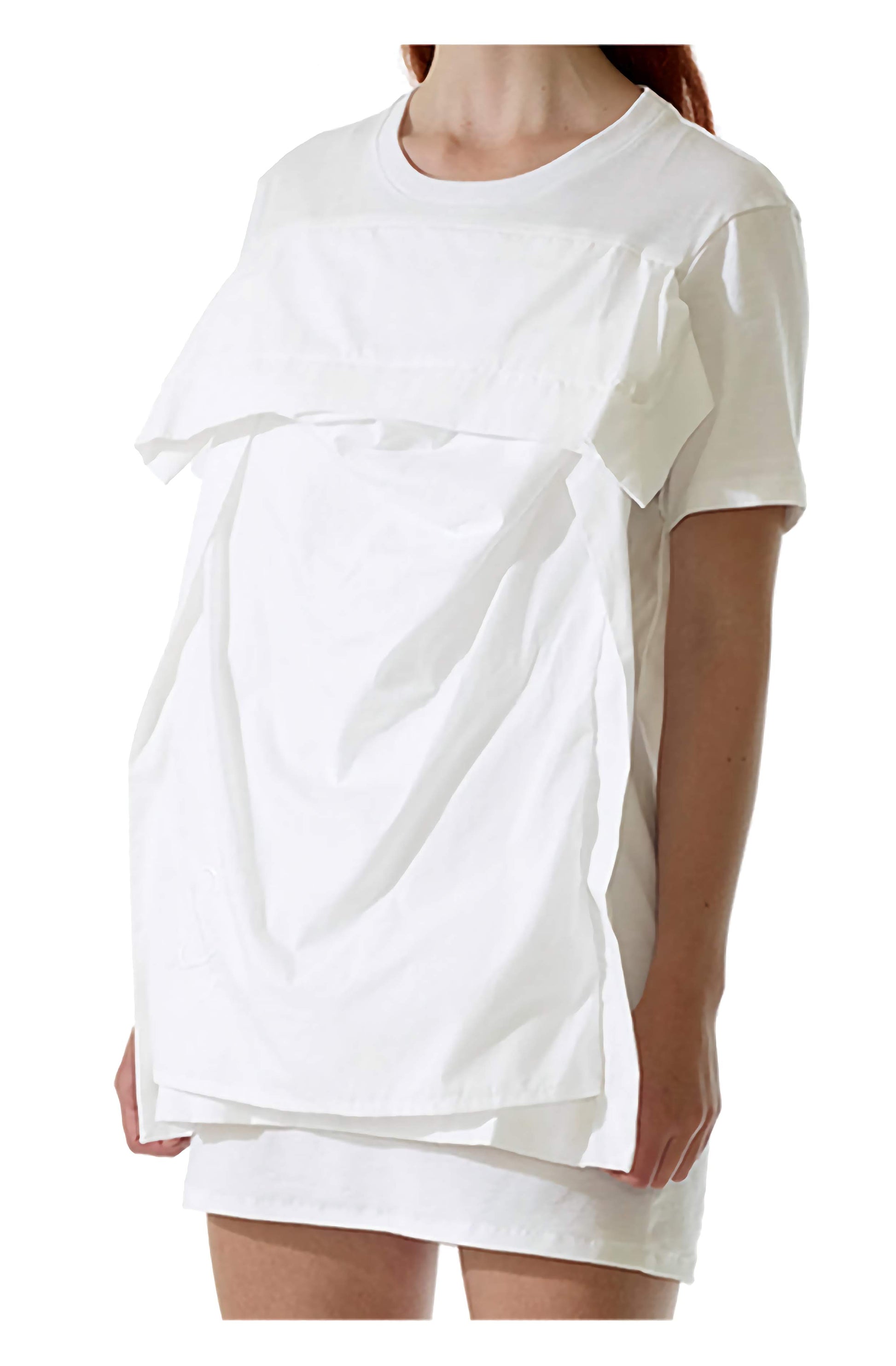 Close up detailed photograph of the pillow case on the front of the organic cotton t-shirt top dress which is a unisex fashion garment.