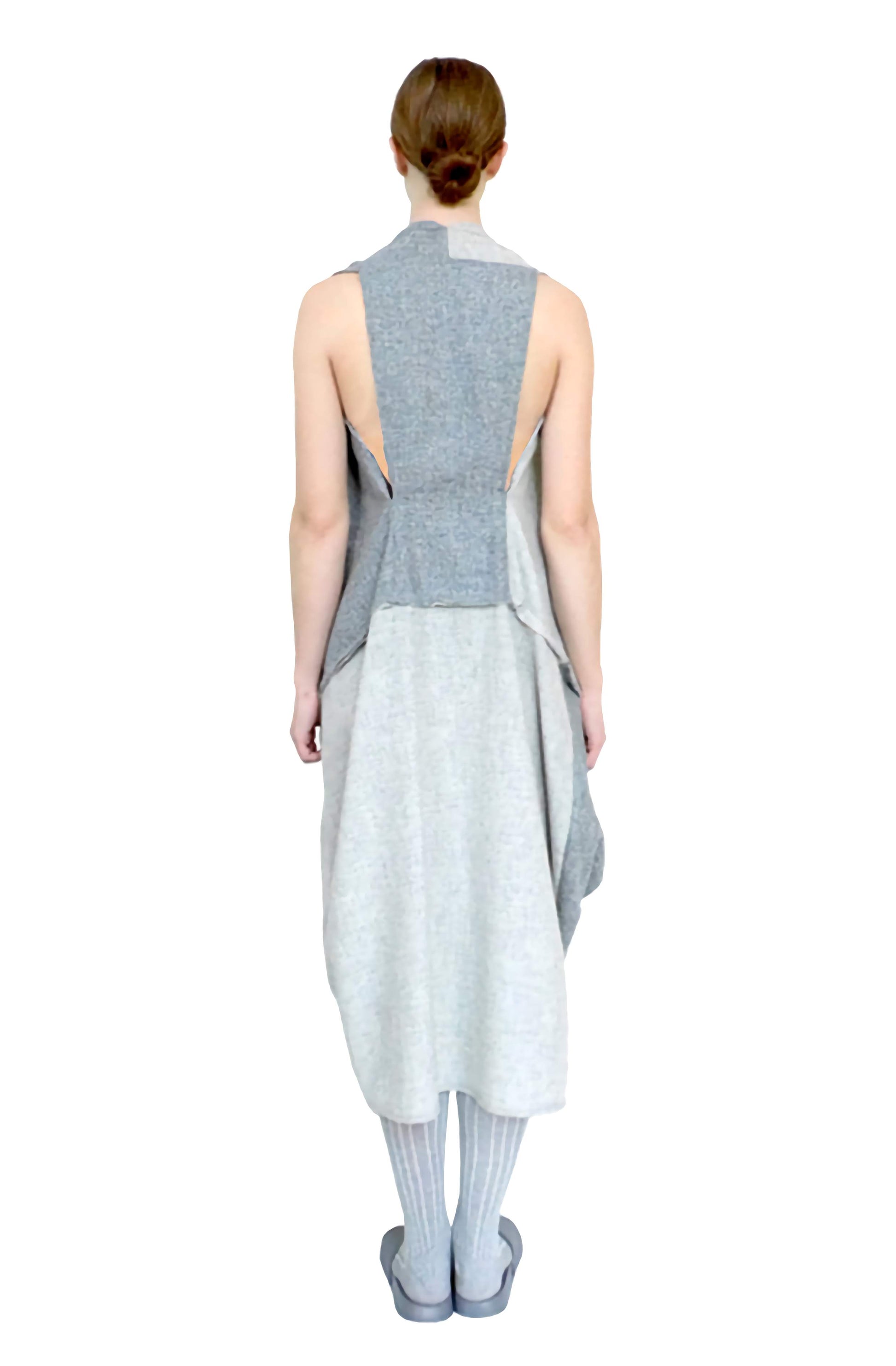 Original back view of the tailored handcrafted, multi grey draped wool knotted dress.