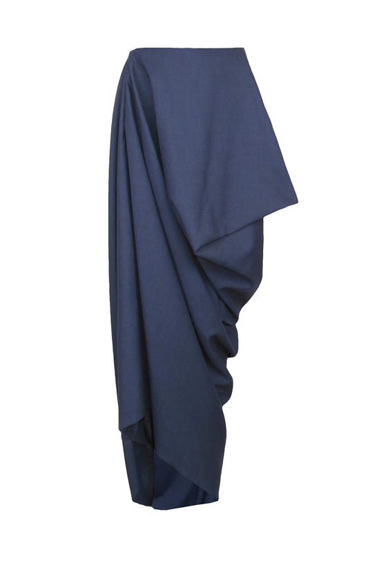 A navy blue skirt with an asymmetrical drape and hidden pocket, fastened with a zipper on the front.