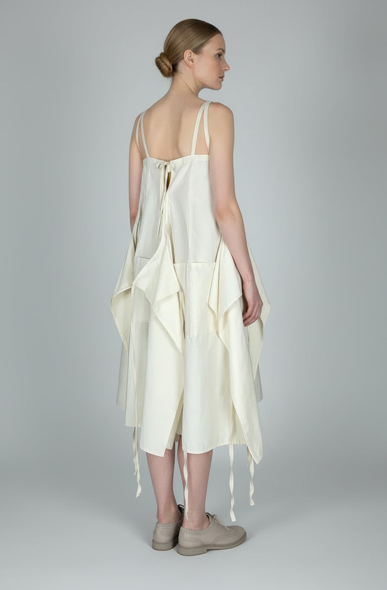 Aprons dress back view a zero waste circular eco design womenswear fashion in organic cotton