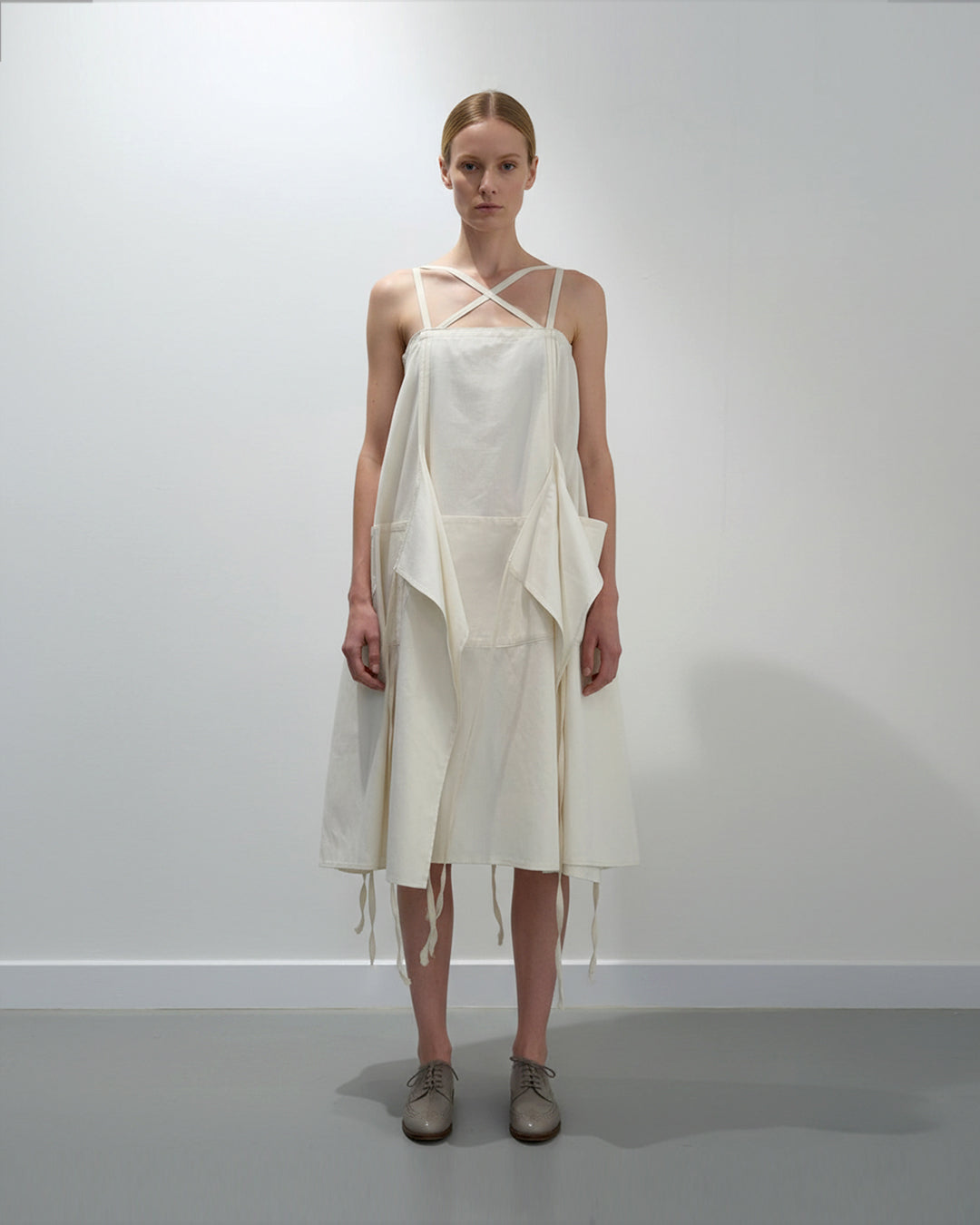 Aprons dress a zero waste sustainable gown made in organic cotton in UK by Cunnington & Sanderson