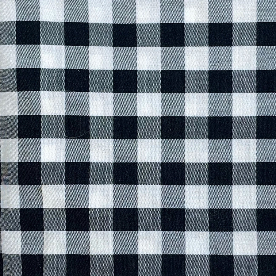 Black and white checkered gingham fabric pattern clode up detail