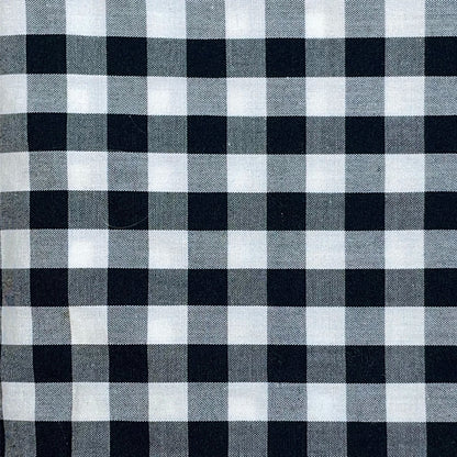 Black and white checkered gingham fabric pattern clode up detail