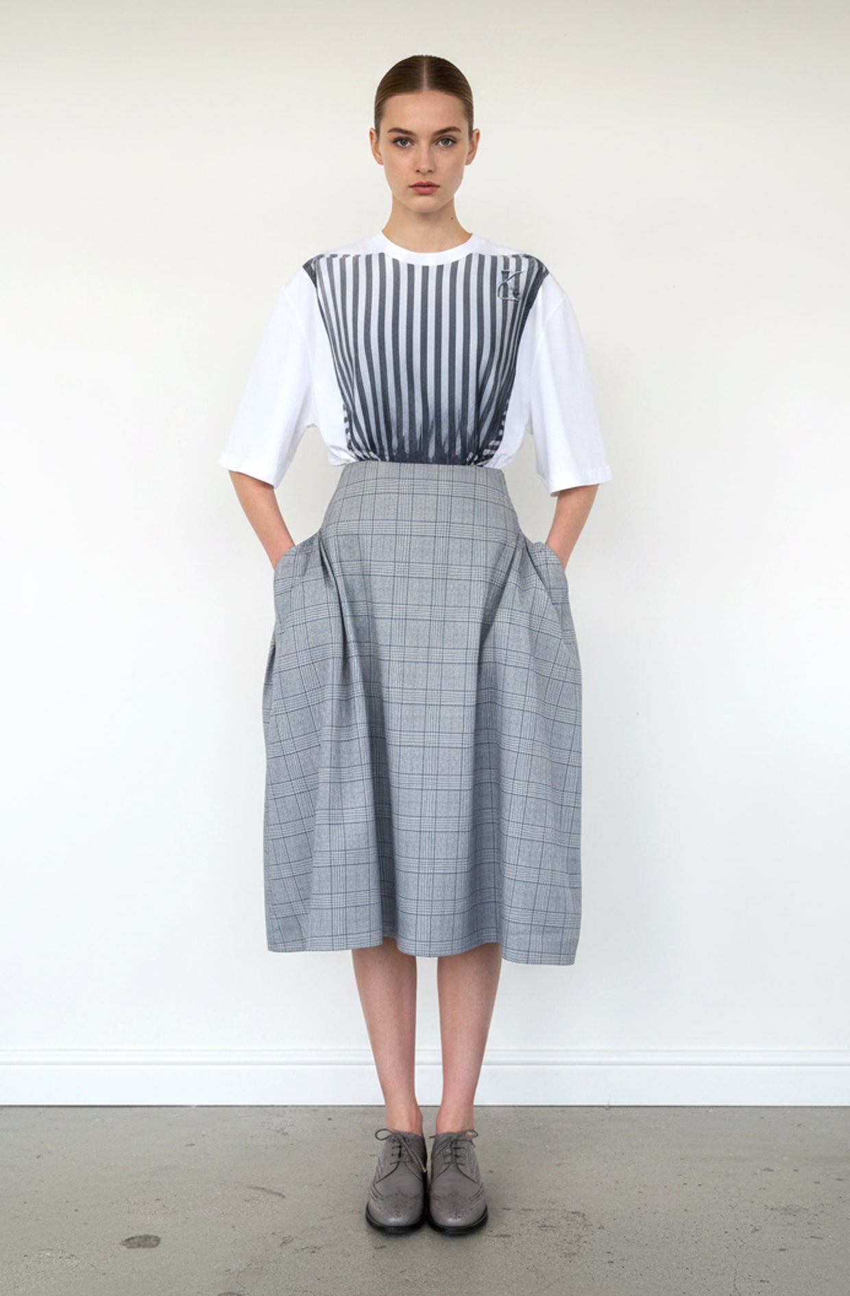 Blue plaid blanket skirt with white top, zero-waste Yorkshire fabric sustainable made-to-order UK