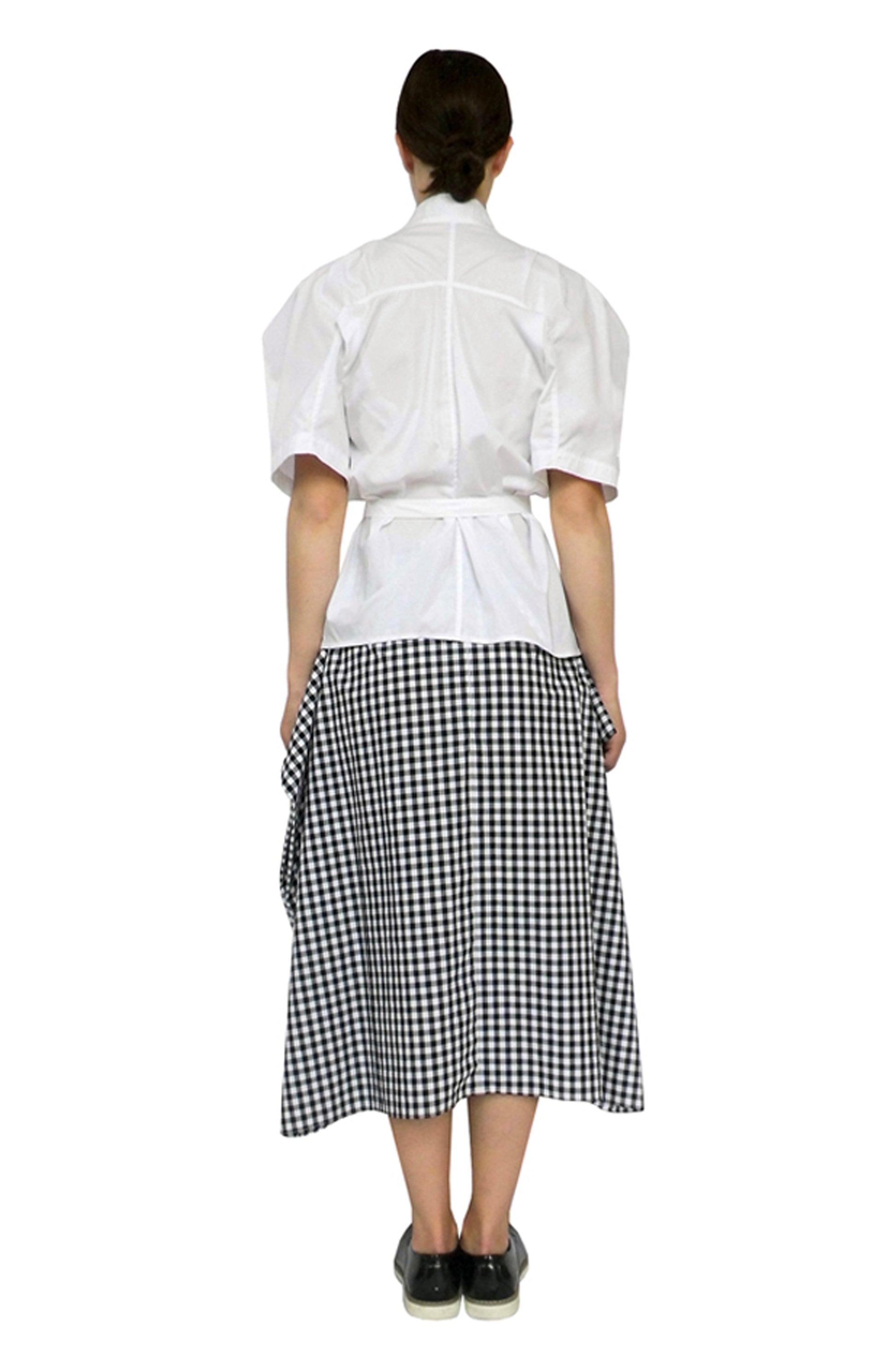 Zero-waste gingham cotton blanket skirt with boxy silhouette and pockets, sustainable luxury made-to-order in UK