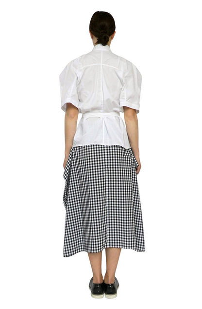 Zero-waste gingham cotton blanket skirt with boxy silhouette and pockets, sustainable luxury made-to-order in UK