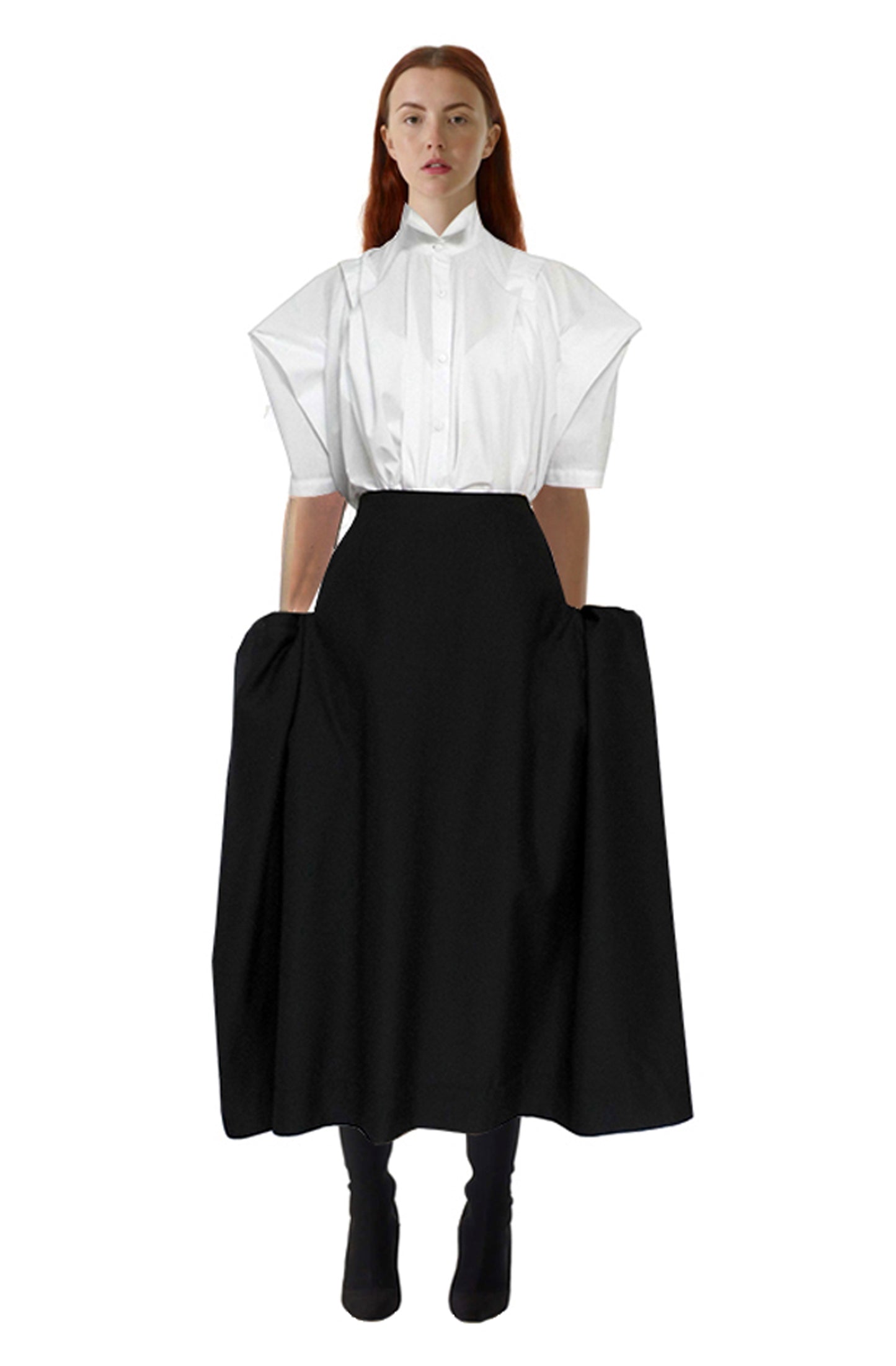 Zero-waste black cotton blanket skirt with boxy silhouette and pockets, sustainable luxury made-to-order in UK