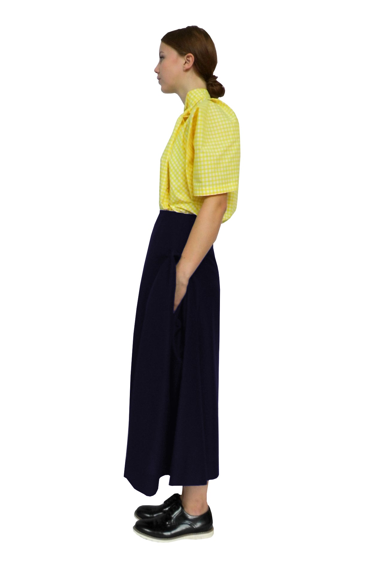 Side view of the zero-waste blanket pocket skirt made with locally sourced traditional fabric