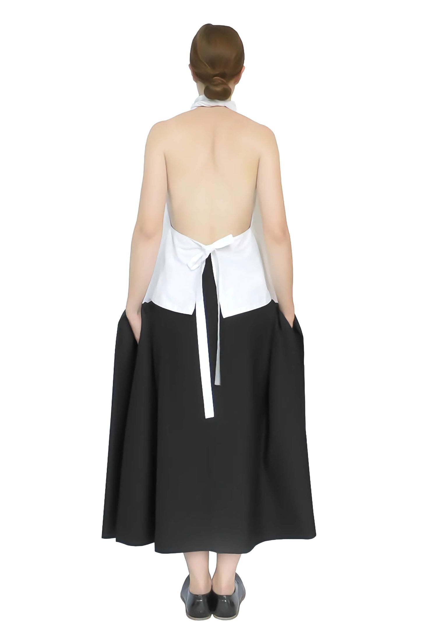 Back view of the artistic white blanket top with a beautiful modern open back