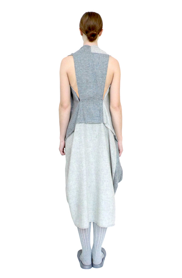 back view of the tailored handcrafted multi grey draped wool flattering knotted dress