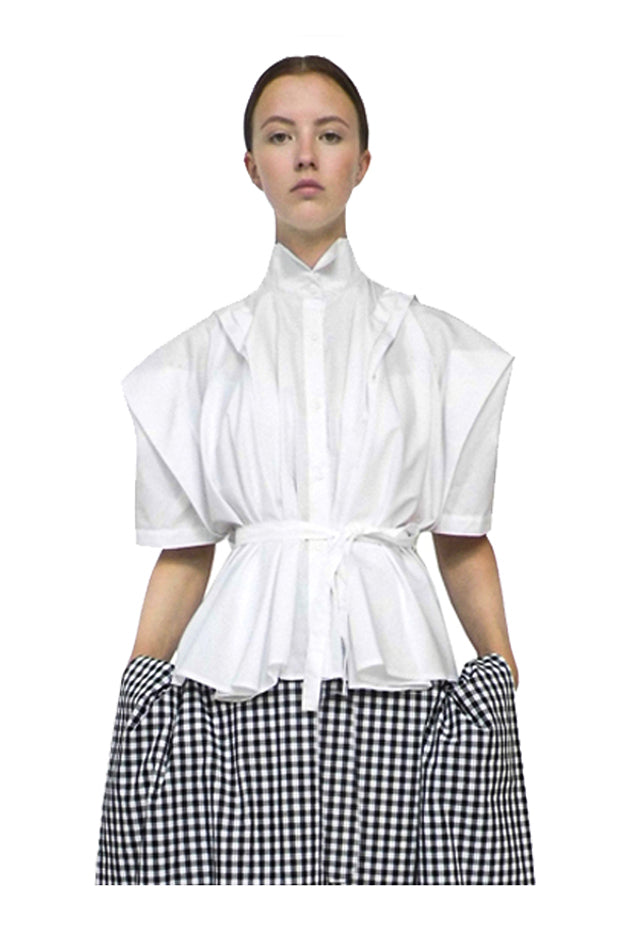 White crisp farmers shirt with winged collar boy kimono sleeves made in one piece creating an artistic seamless design