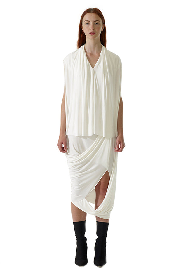 model wearing a white luxury drape top by multi award winning pioneers in zero waste design cunnington and sanderson