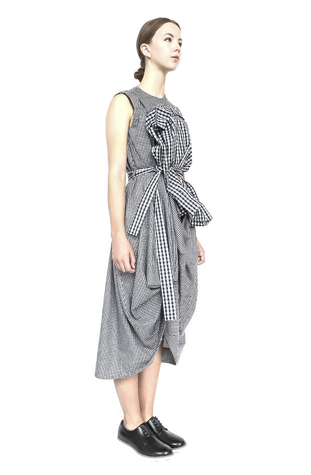 side view designer gingham cotton dress with large functional carrier bag pocket and draped contemporary silhouette