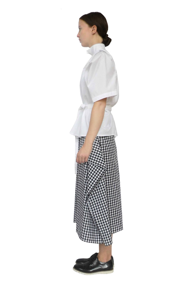 Sculptural regal skirt with large origami fabric folds with hidden pockets, also available virtually