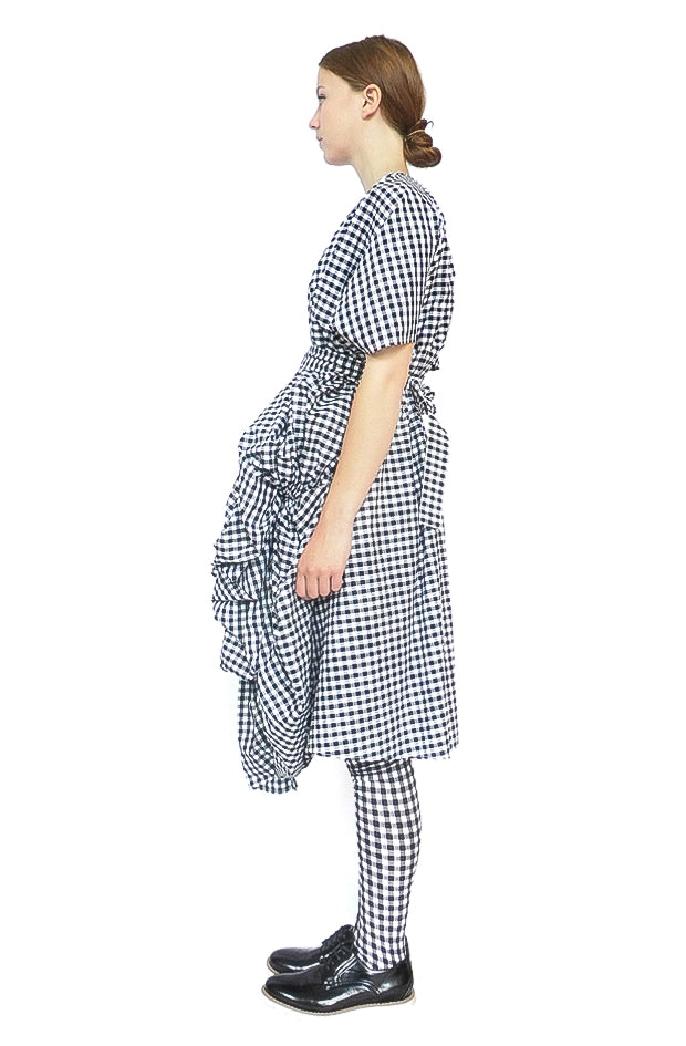 side view luxury gingham cotton designer dress with voluminous front with high waisted belt
