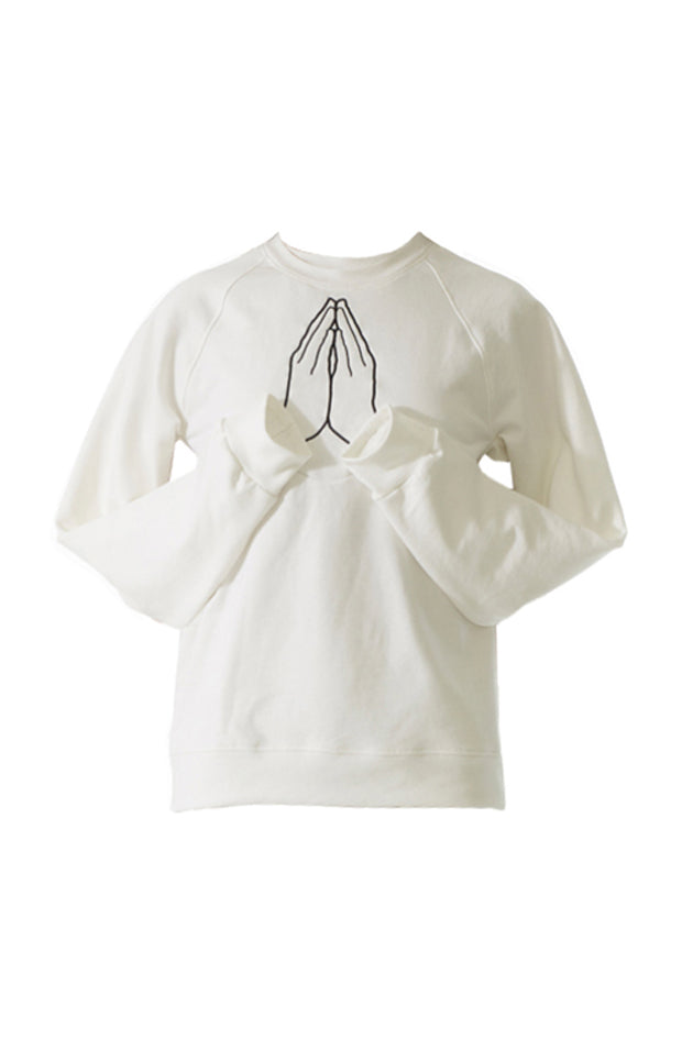 unique and sustainable organic cotton sweatshirt with draped sleeves and embroidered hands to symbolise hope