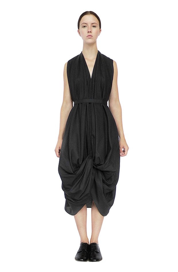 long black draped sustainable fashion zero waste design knotted dress with good luck knot structure and tailored fitting back