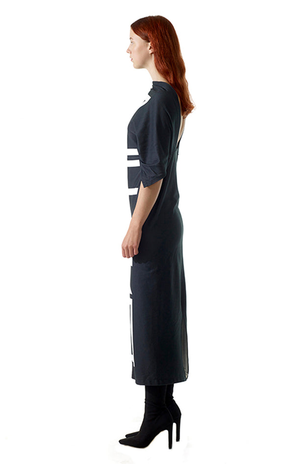 female model is wearing high end fashion organic black long dress by award winning british brand cunnington & sanderson