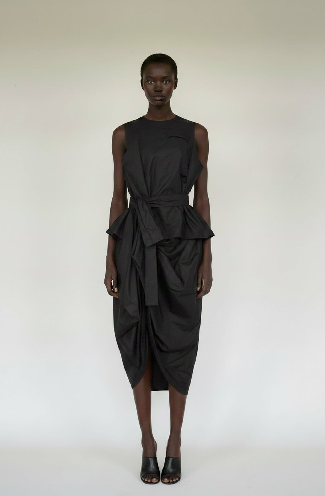 Contemporary black designer dress for life, sculpted by hand to create sustainable design