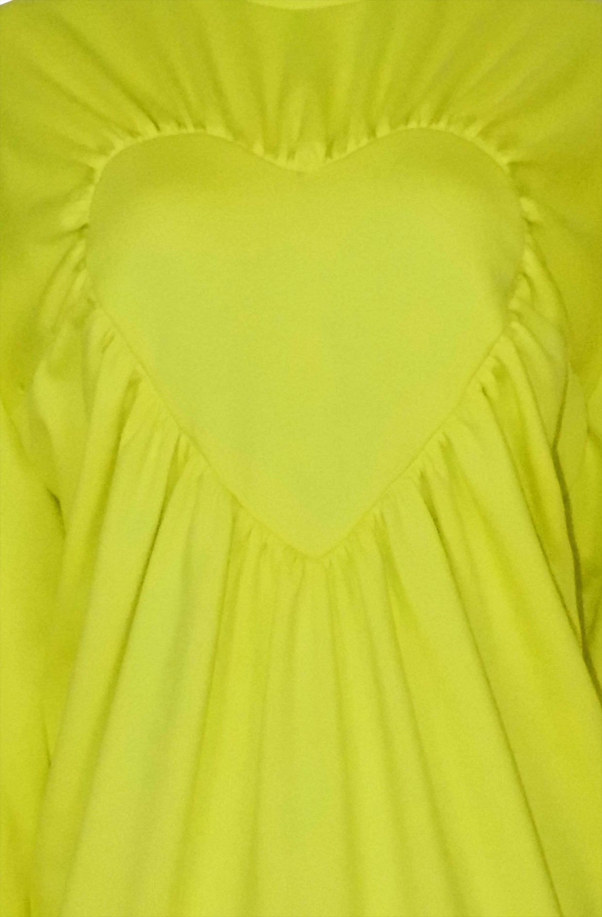 Close-up of organic cotton heart sweater gathered detail, 10% to Mind charity sustainable luxury made in UK