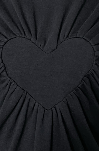 Close up of the black organic cotton heart t-shirt with gathered edges