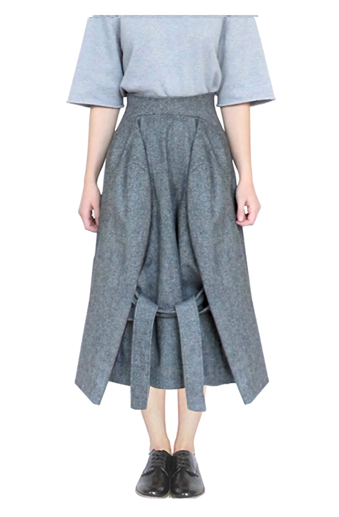 Avant-garde, tailored, midi skirt made in locally sourced Abraham Moon and Son's Yorkshire wool
