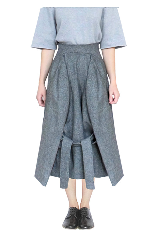 Avant-garde, tailored, midi skirt made in locally sourced Abraham Moon and Son's Yorkshire wool