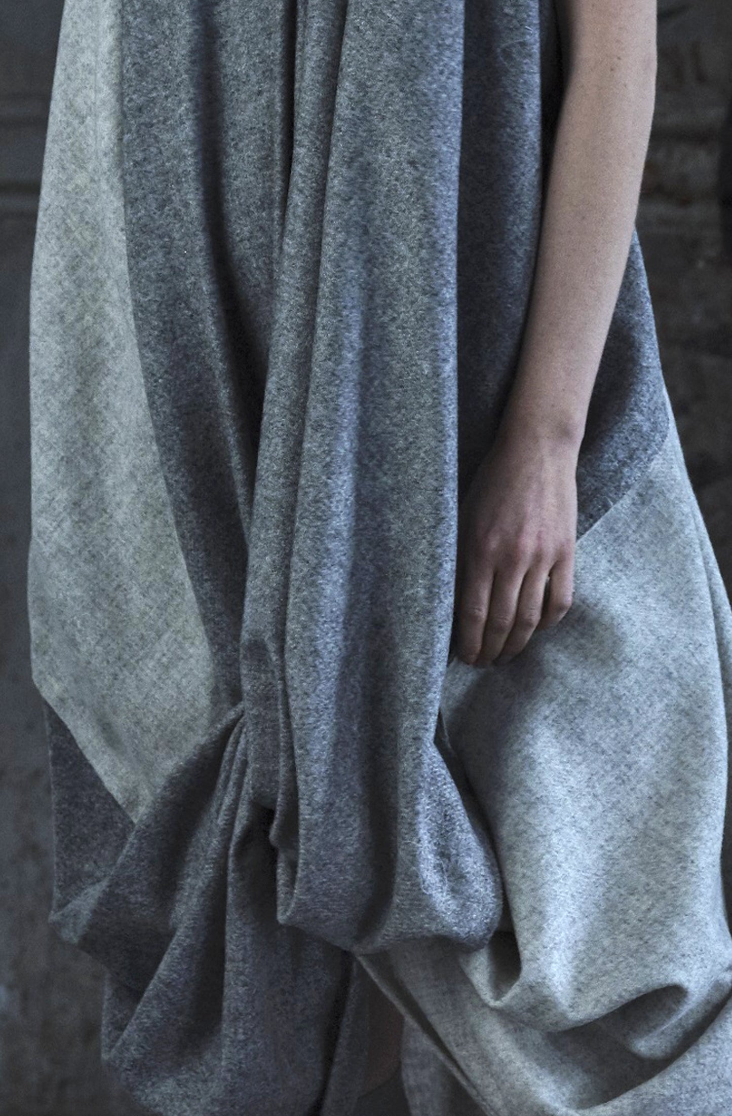 Creative zero-waste drape design with luxurious wool from Abraham Moon & Sons in Yorkshire