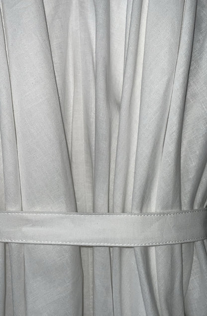 Close-up of the white zero waste knotted dress with a belt made in UK