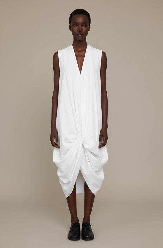 White knotted dress with crafted good luck knot structure, zero-waste sustainable made-to-order UK