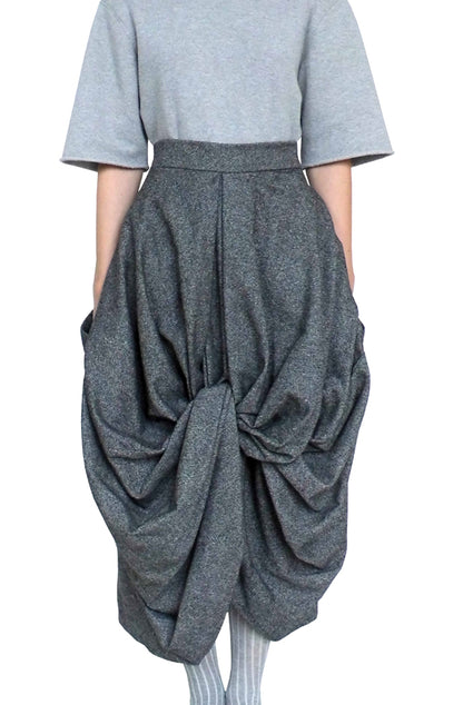 Beautiful draped knot skirt made in a wearable, zero-waste, sustainable design with pockets