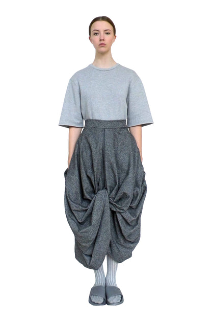 Zero waste contemporary long-length drape skirt with voluminous Yorkshire wool good luck knot