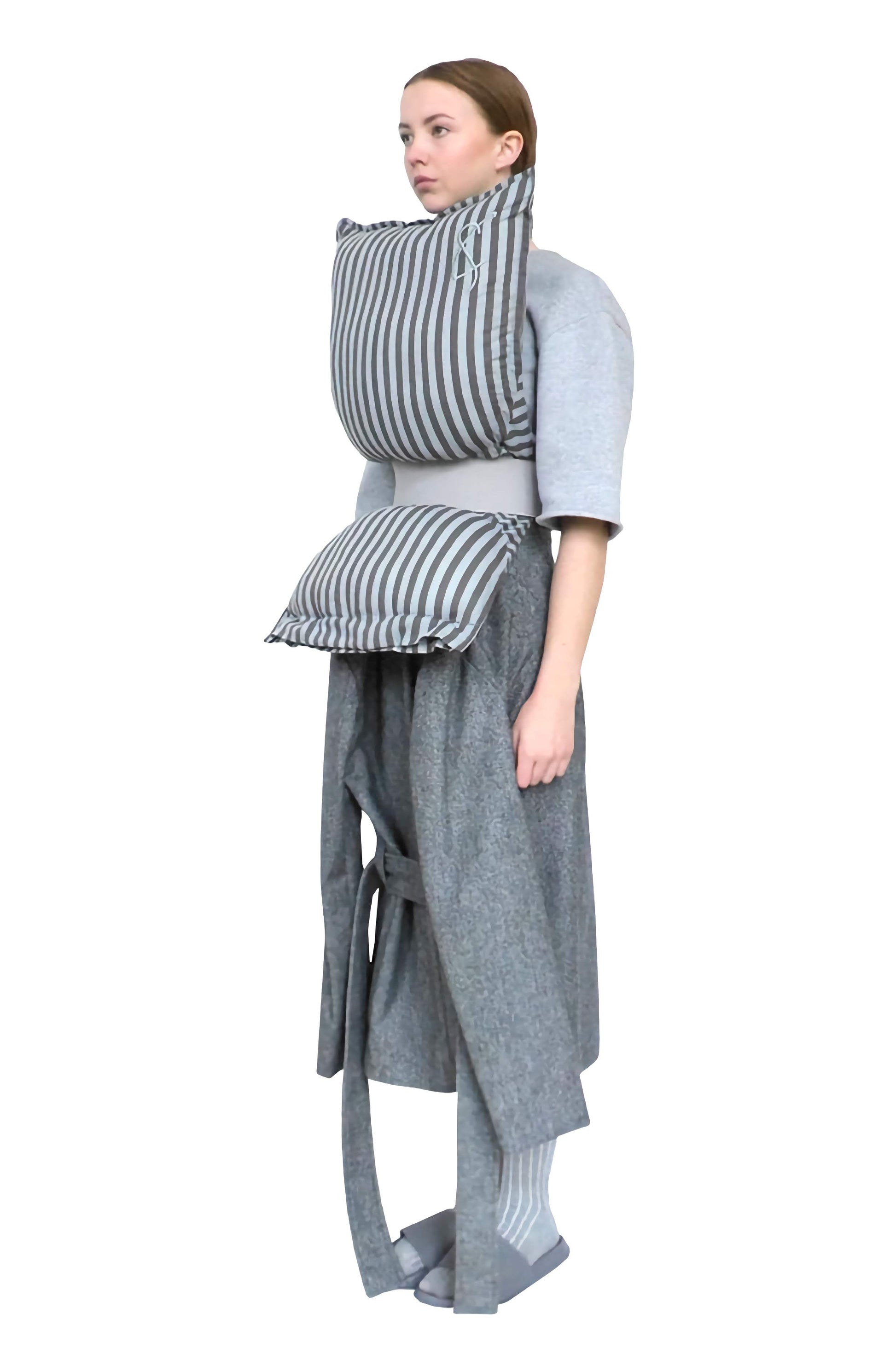Womenswear model wearing the original iconic pillow top be cunnington and sanderson, a wearable luxury top in the shape of a pillow silhouette unique artisan creative style.