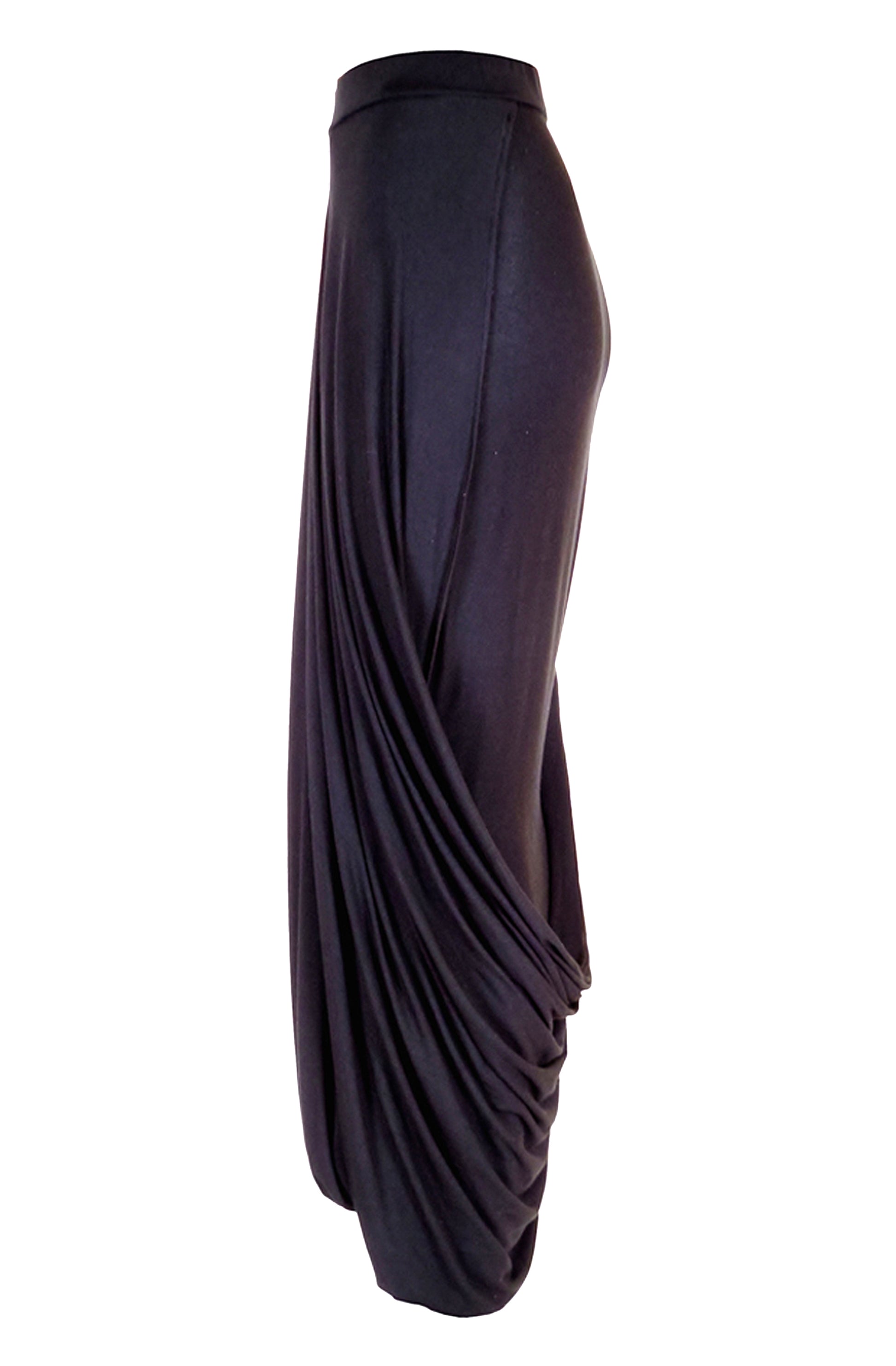 Loop skirt side view showing sculptural draping and fabric loop detail, avant-garde UK fashion