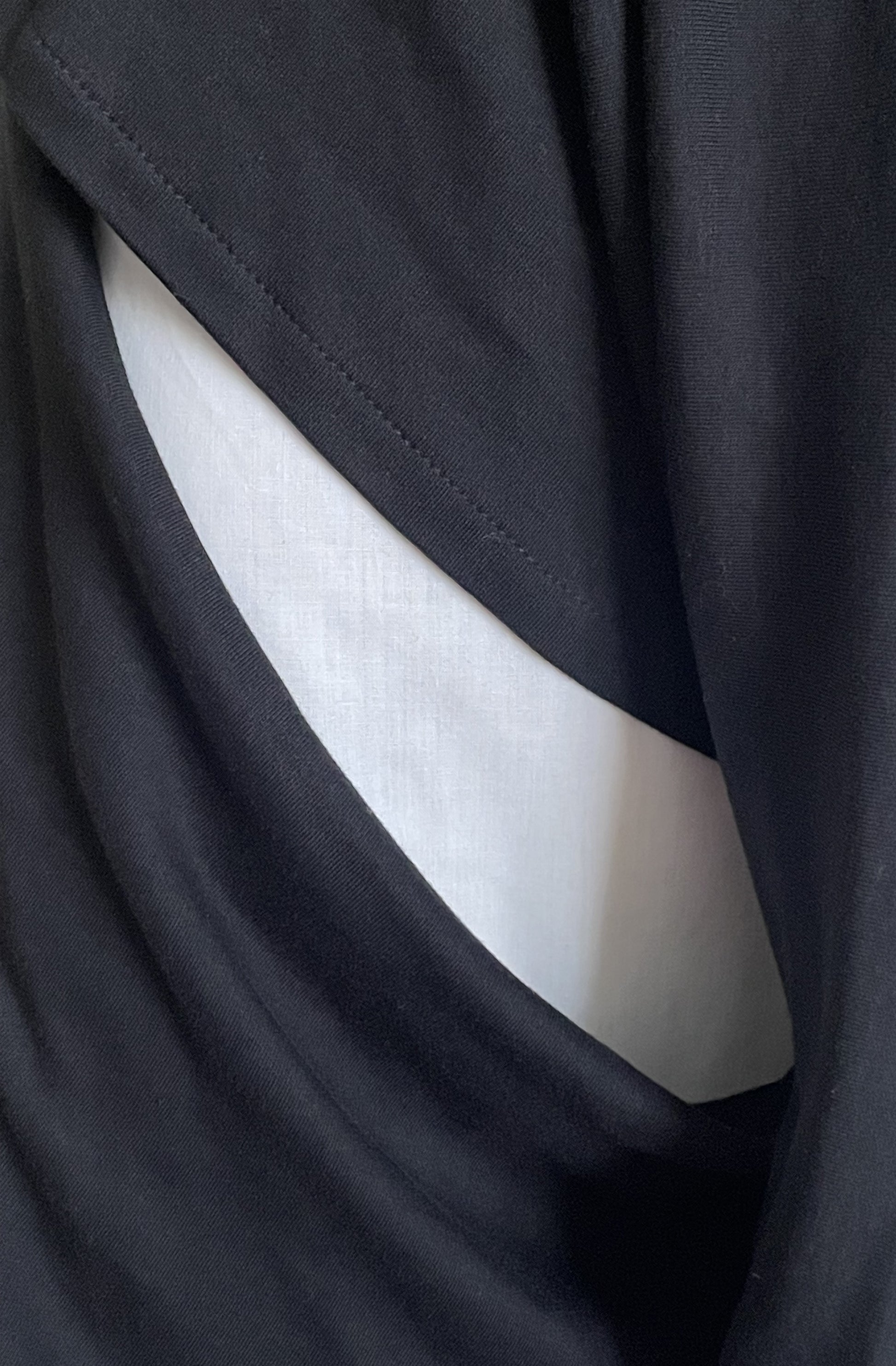 Close-up zero waste missing top in black organic cotton. Sustainable fashion made in UK