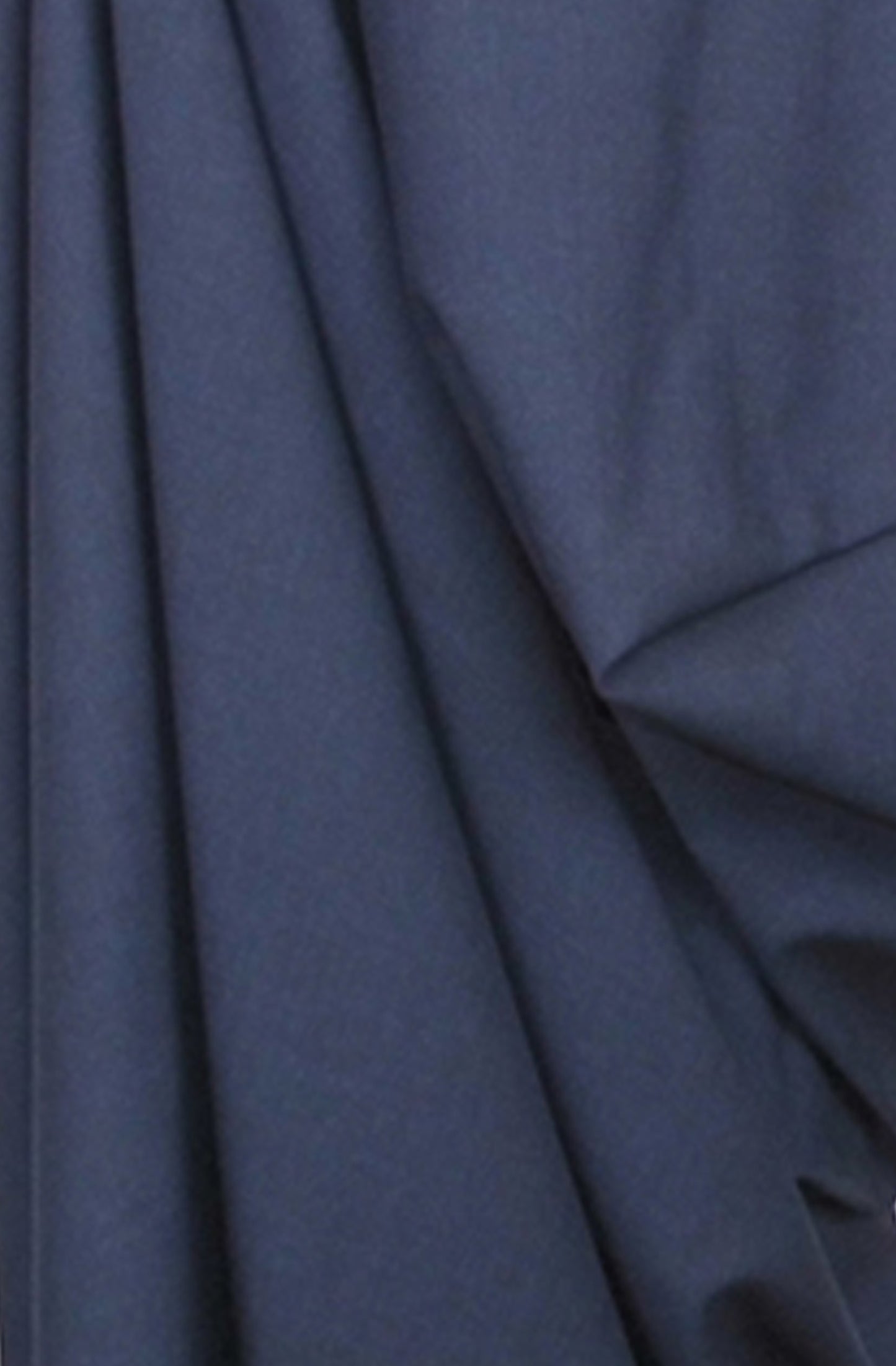 Close-up of dark NAVY blue fabric with folds