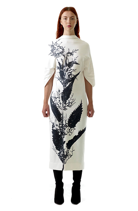 Long luxurious dress skillfuly crafted from a zero waste sustainable design, with nettle print made with eco friendly pigments in uk.
