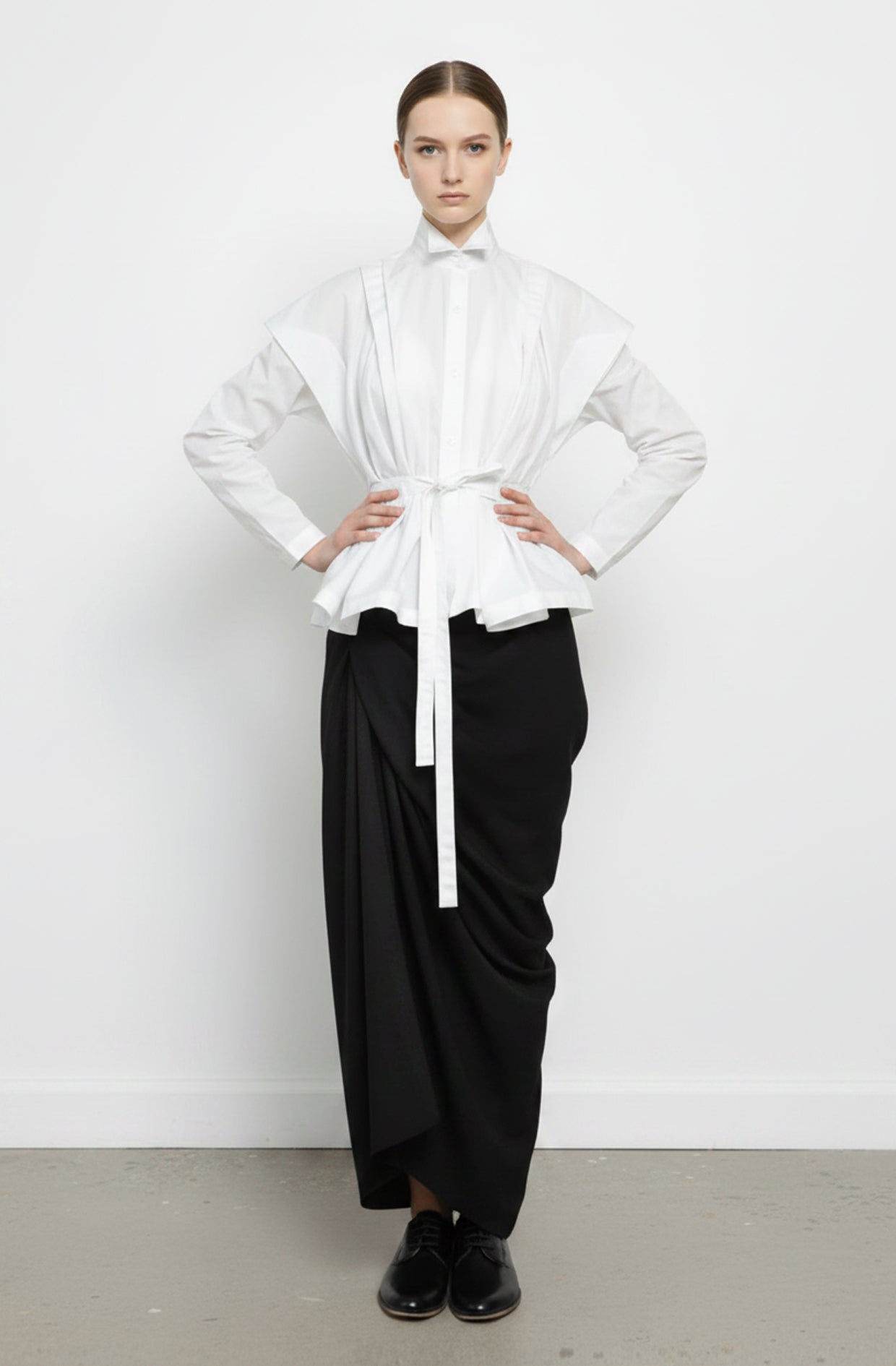 Solid black draped asymmetric midi skirt zero-waste, sustainable, made to order in the UK