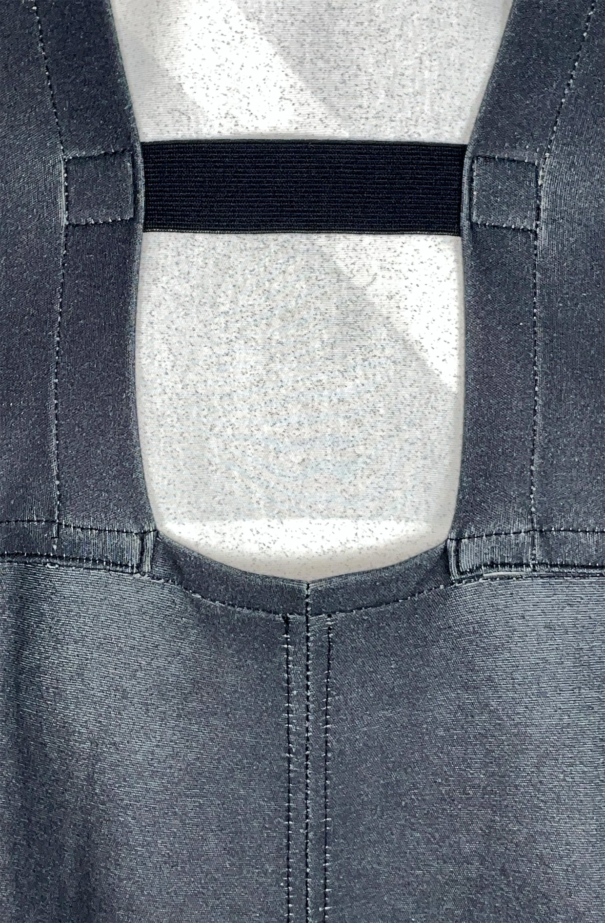 Close-up of zero waste black dress with organic elasticated back band close up detail