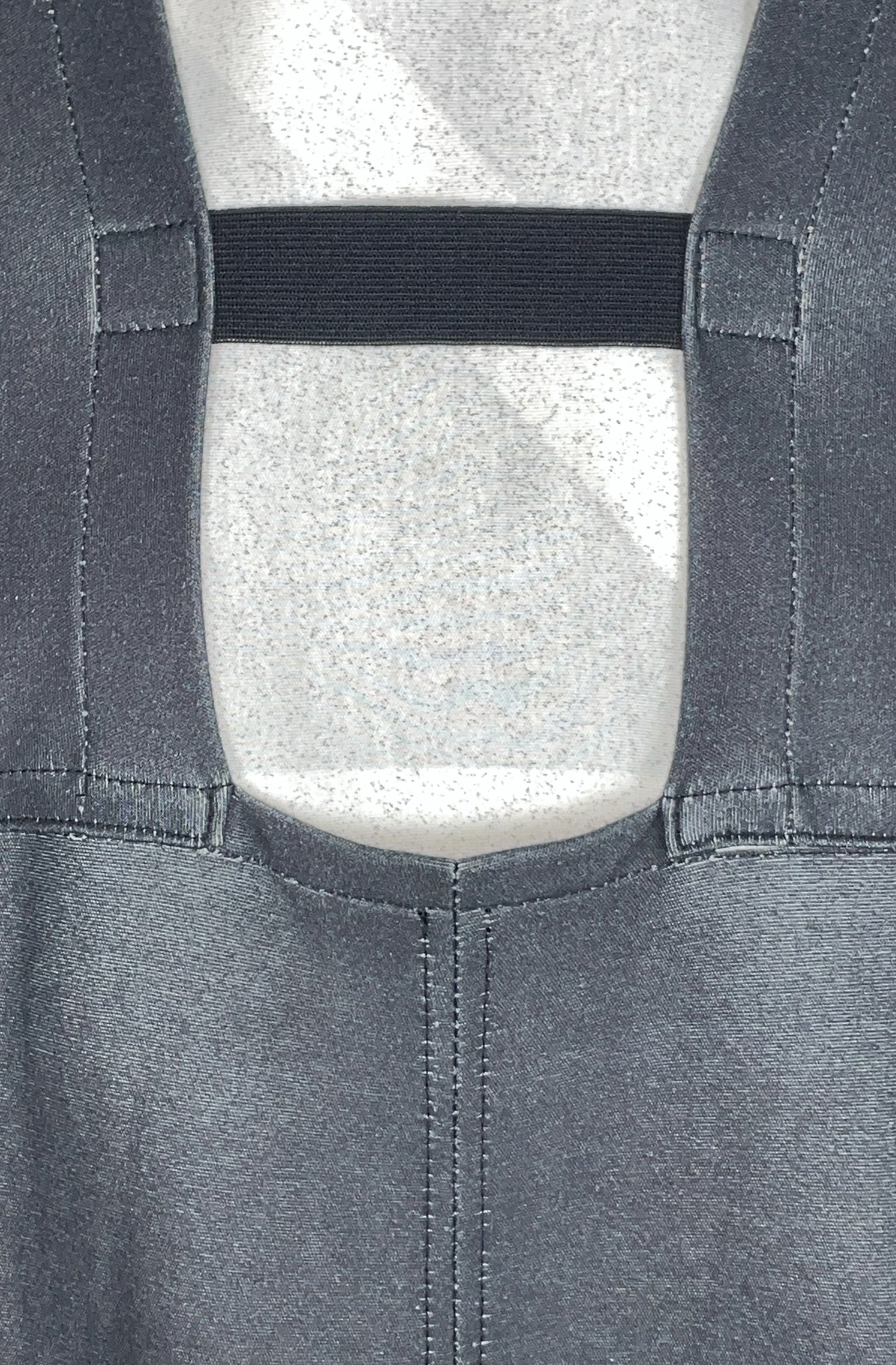 Close-up of zero waste black dress with organic elasticated back band close up detail
